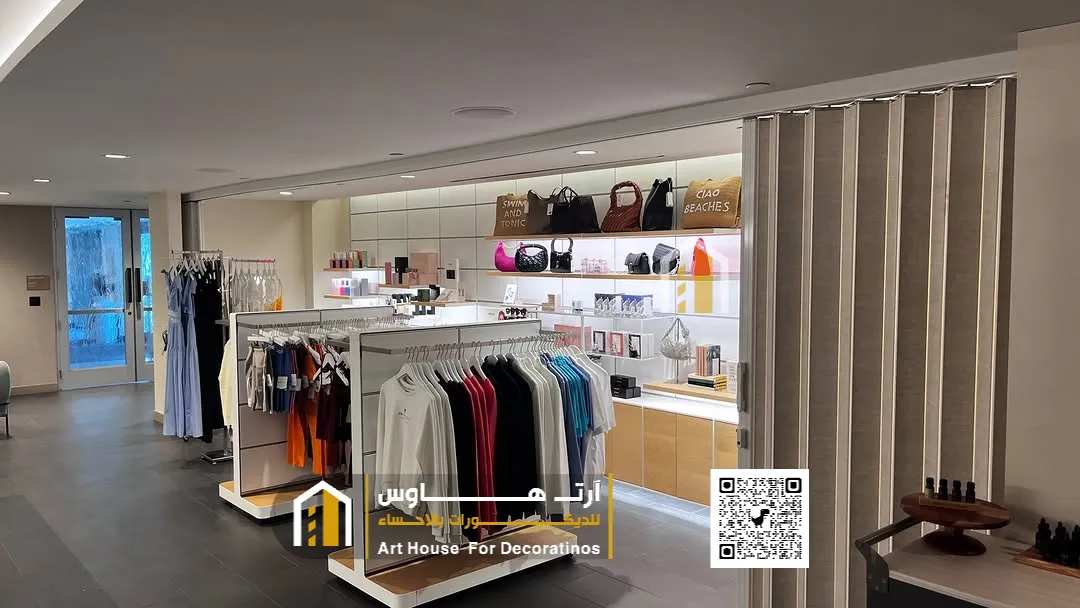 تركيب باب أكورديون خشب في العيون